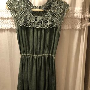 Francesca’s green romper never been worn